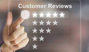 business hand clicking customer reviews on virtual screen interface